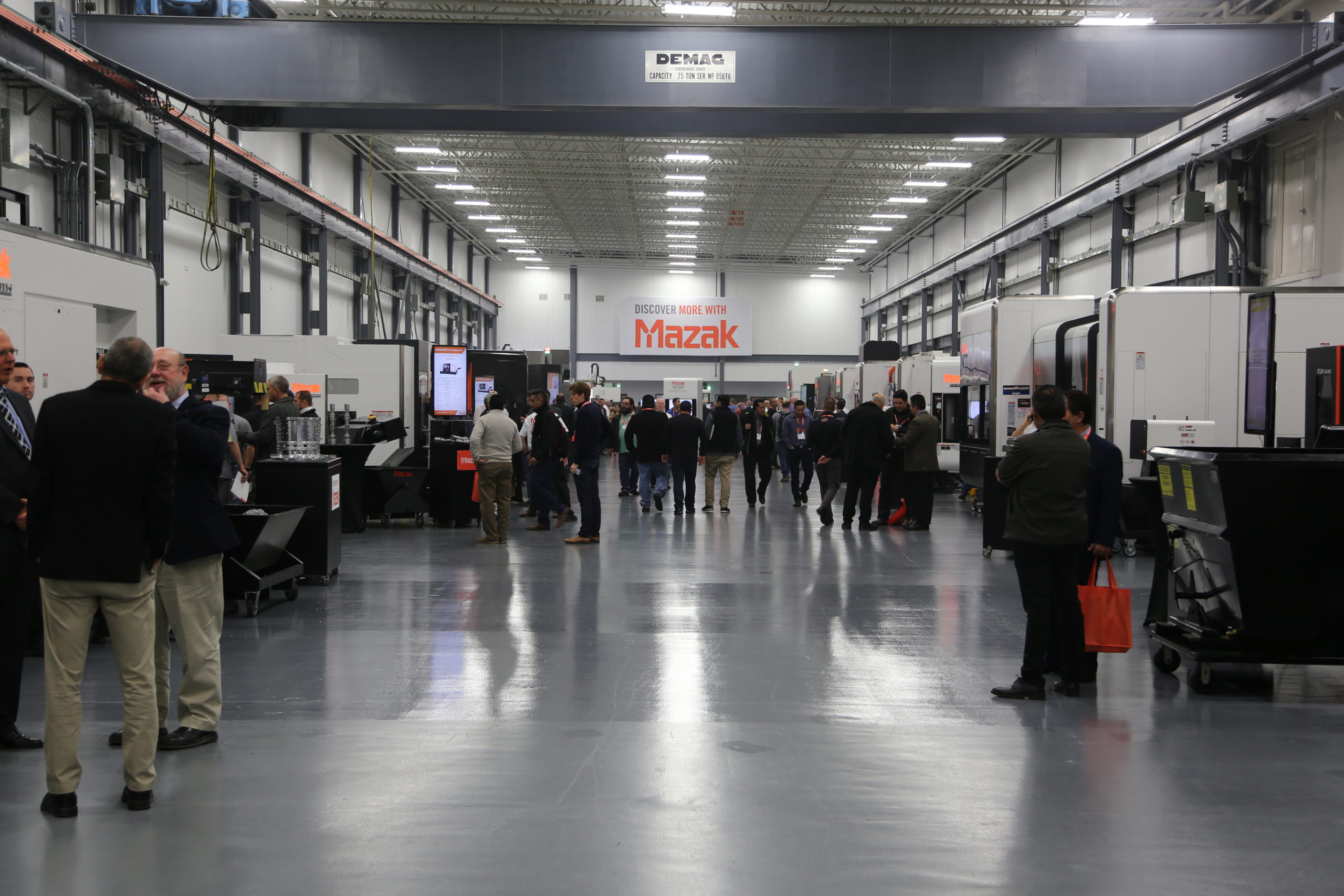 Guest Attendees discuss new machinery and technology at Mazak's DISCOVER 2019 event