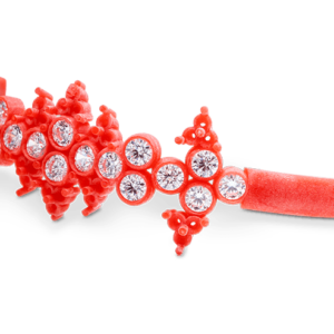 3D printed jewelry pattern using VisiJet Wax Jewel Red, showcasing 100% wax material, flexible wax patterns, fine detail casting, and compatibility with lost wax casting processes.